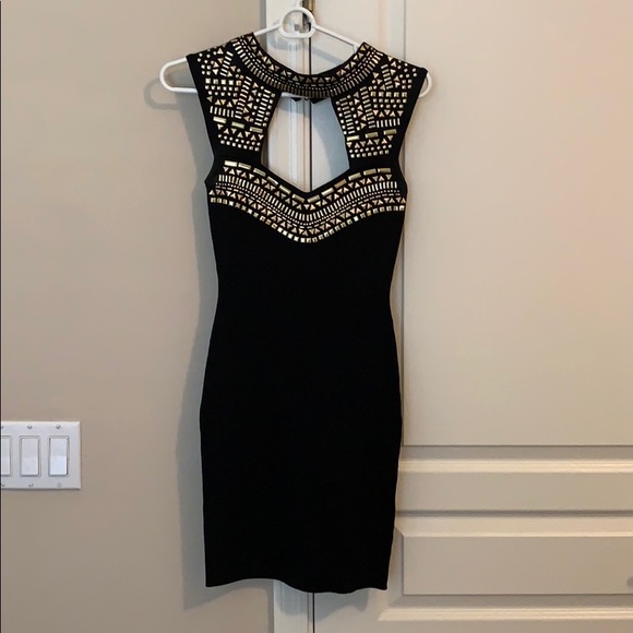 bebe Dresses & Skirts - Bebe black dress with gold embellishments bebe Dresses & Skirts - Bebe black dress with gold embellishments